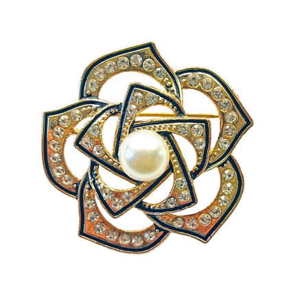 Gold-tone camellia flower brooch with black enamel outlines, clear crystals, and a pearl center by Divalya.