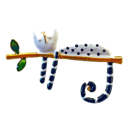 White enamel cat with polka dots sitting on a gold branch brooch – Divalya jewelry